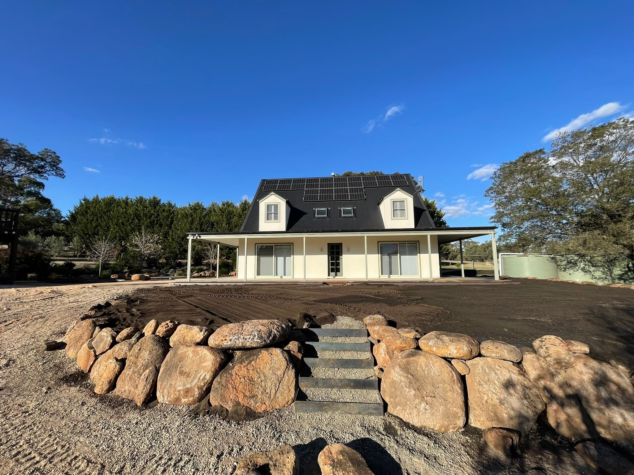 Rock Terrace & Gravel Driveway